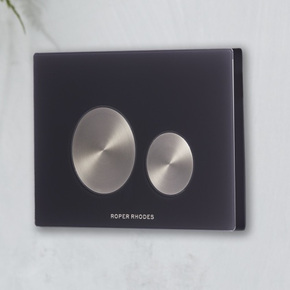 product lifestyle image of Roper Rhodes Black Glass Dual flush Push Plate on grey wall TR9029